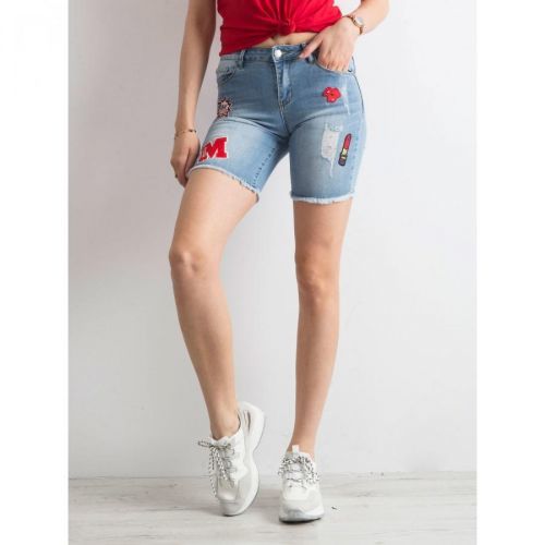 Denim shorts with colorful blue patches