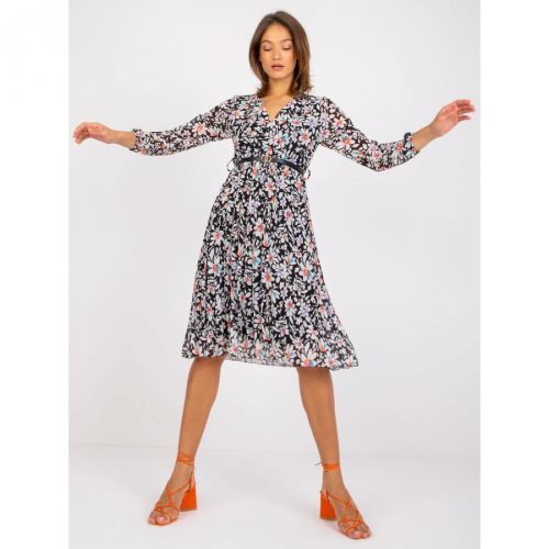 Black dress with a print of Girona flowers