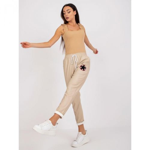 Beige trousers made of eco-leather with pockets Lana