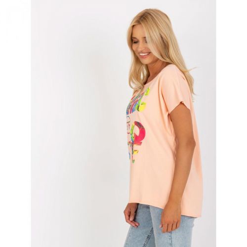 Peach blouse with a print and short sleeves