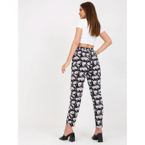 Black light trousers made of fabric with flowers SUBLEBEL