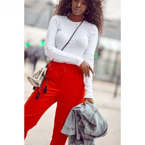 A set of women's trousers with a crease and a blouse in red and white