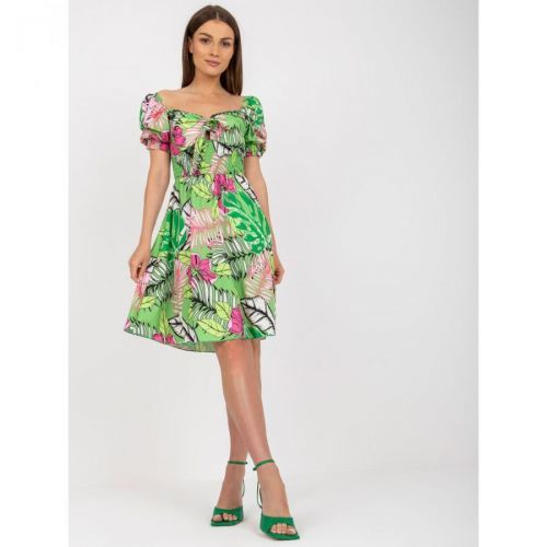 Green, patterned Spanish dress with short sleeves