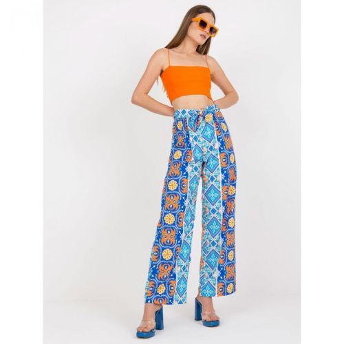 Blue wide trousers with a pattern in the fabric