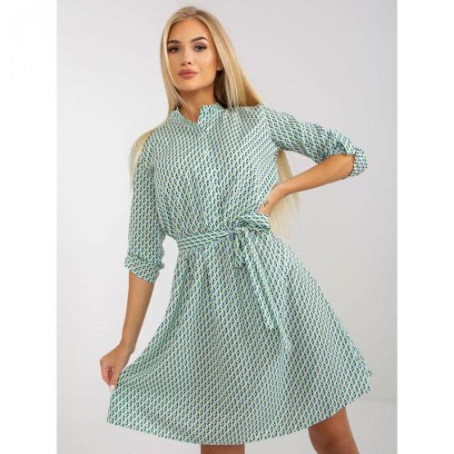 Casual white and green dress with a button closure