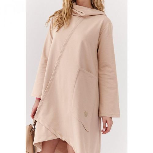 A trapezoidal beige dress with a wide turtleneck