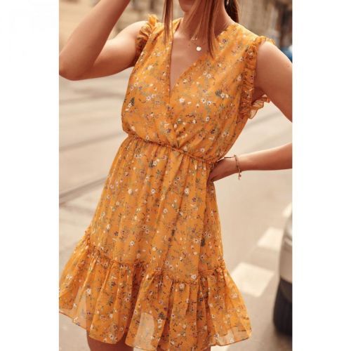 A delicate mustard dress with flowers