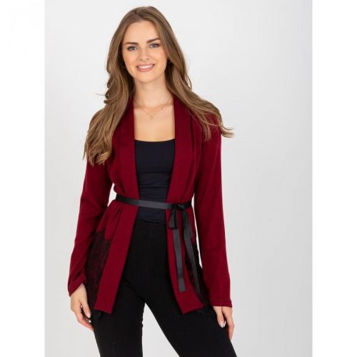 A burgundy knitted cape with a tied belt