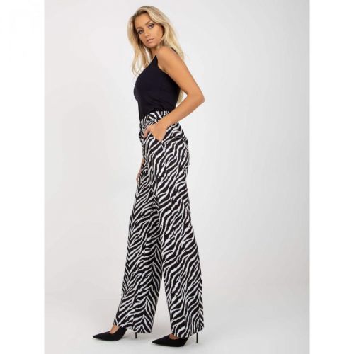 Black and white wide trousers in an animal print fabric