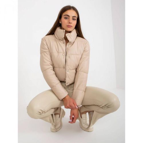 Beige short down jacket made of eco-leather with quilting