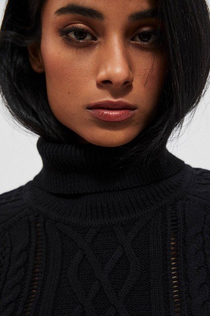 A turtleneck with a braid weave