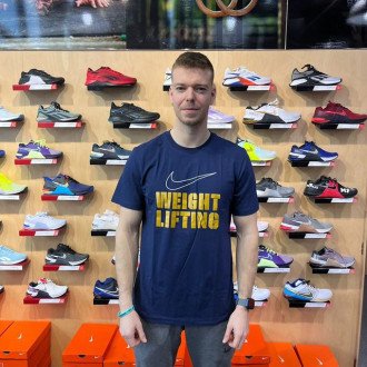 Nike  tričko Nike Weightlifting Big Swoosh - bílé/zlaté APS325-470