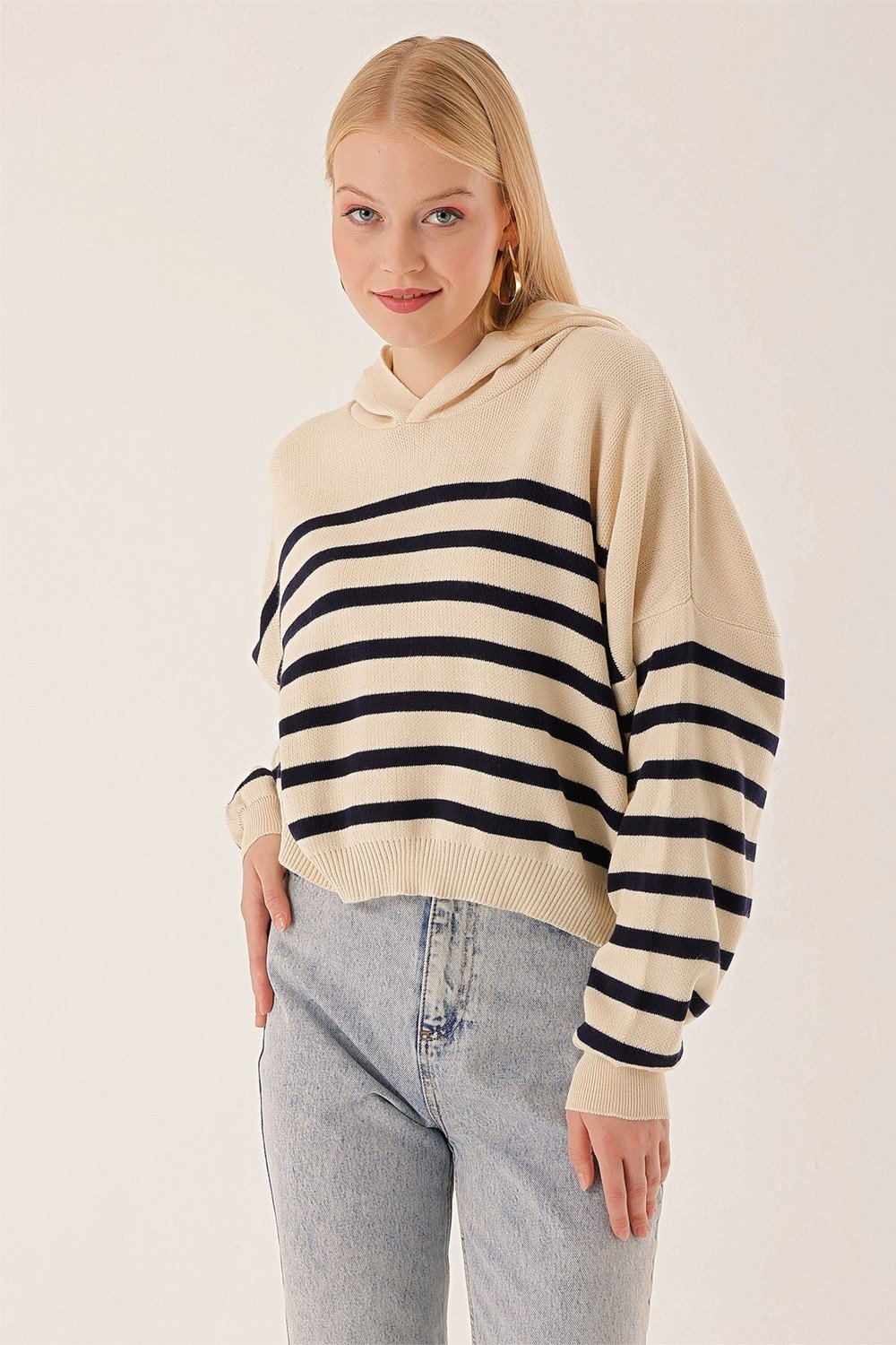 HAKKE Striped knit sweater with a hoodie.