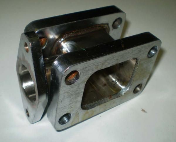Turbo Parts Redukční adaptér na turbo T3 > T3 + wastegate 38mm (nerezová ocel)