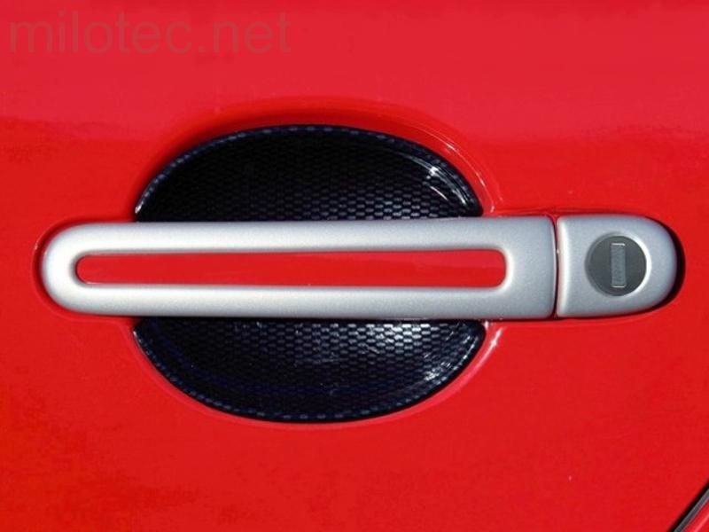 Milotec Kryty klik - oválný otvor, stříbrné matné, (4+4 ks dva zámky),Škoda Fabia I. Facelift 2004 - 2007