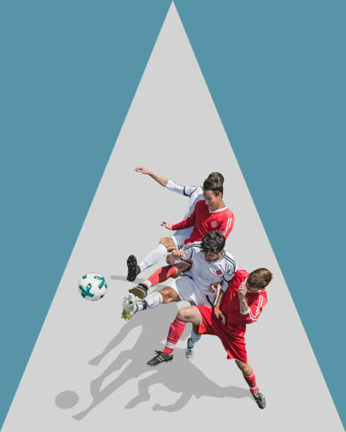 Bernhard Lang Umělecká fotografie Four Soccer Players fighting for ball,, Bernhard Lang, (30 x 40 cm)