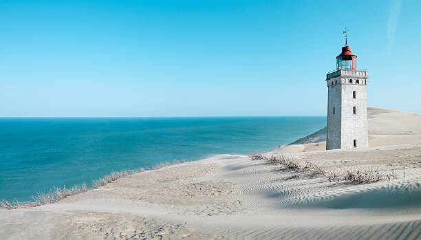 Markus Hanke Umělecká fotografie Lighthouse on a sand dune, Rubjerg, Markus Hanke, (40 x 22.5 cm)