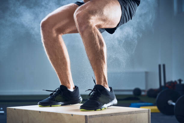 Westend61 Umělecká fotografie Closeup of man doing box jump exercise at gym, Westend61, (40 x 26.7 cm)