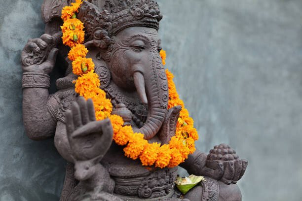 Bicho_raro Umělecká fotografie Ganesha with balinese Barong masks, flowers, Bicho_raro, (40 x 26.7 cm)