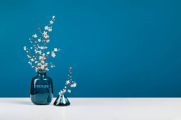 Aleksandra Konoplia Umělecká fotografie Blue glass vases with bouquet of, Aleksandra Konoplia, (40 x 26.7 cm)