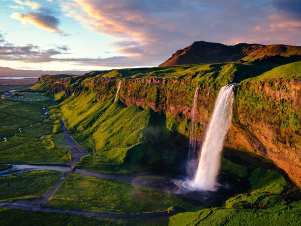 Matteo Colombo Umělecká fotografie Aerial of Seljalandsfoss waterfall at sunset,, Matteo Colombo, (40 x 30 cm)