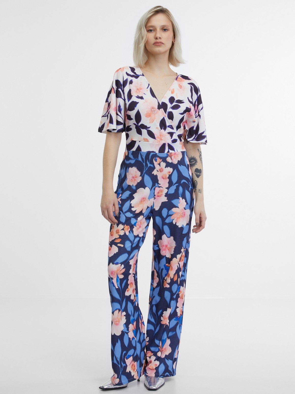 Orsay Tmavě modrý dámský květovaný overal - Dámské