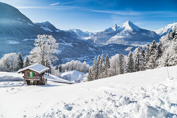bluejayphoto Umělecká fotografie Winter wonderland with mountain chalet in the Alps, bluejayphoto, (40 x 26.7 cm)