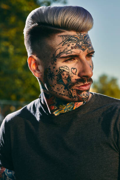 Westend61 Umělecká fotografie Portrait of tattooed young man outdoors, Westend61, (26.7 x 40 cm)