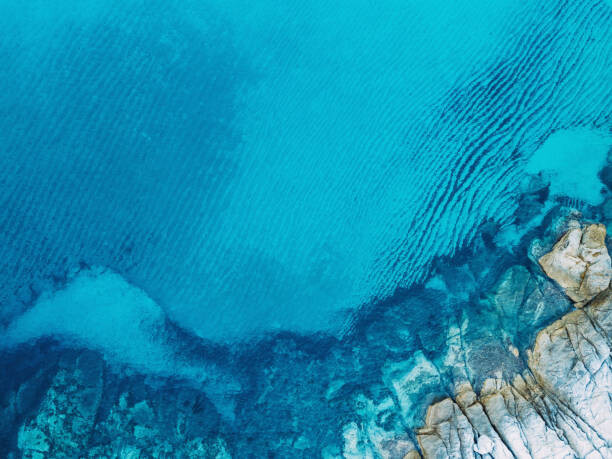pixelfit Umělecká fotografie Clear blue sea and rocks, pixelfit, (40 x 30 cm)
