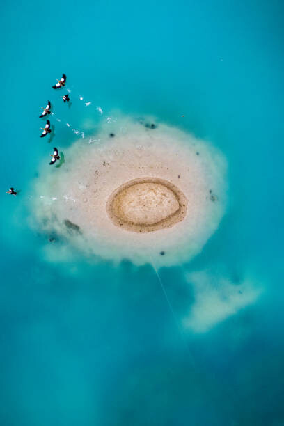 Abstract Aerial Art Umělecká fotografie Island in vibrant mine water, Germany, Abstract Aerial Art, (26.7 x 40 cm)