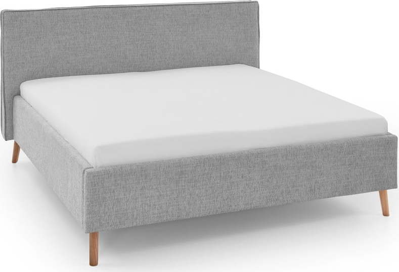 Světle šedá čalouněná dvoulůžková postel s úložným prostorem s roštem 160x200 cm Riva – Meise Möbel