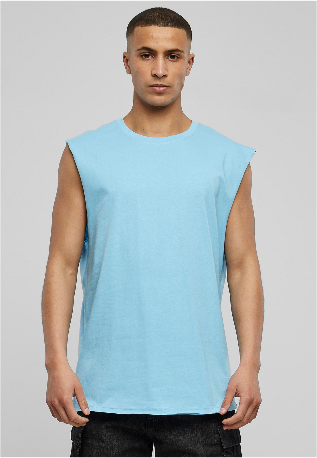 Baltické modré tričko bez rukávů s otevřeným okrajem