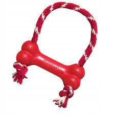 Hračka Kong Dog Puppy Classic Kosť červená s lanom, guma prírodná, M
