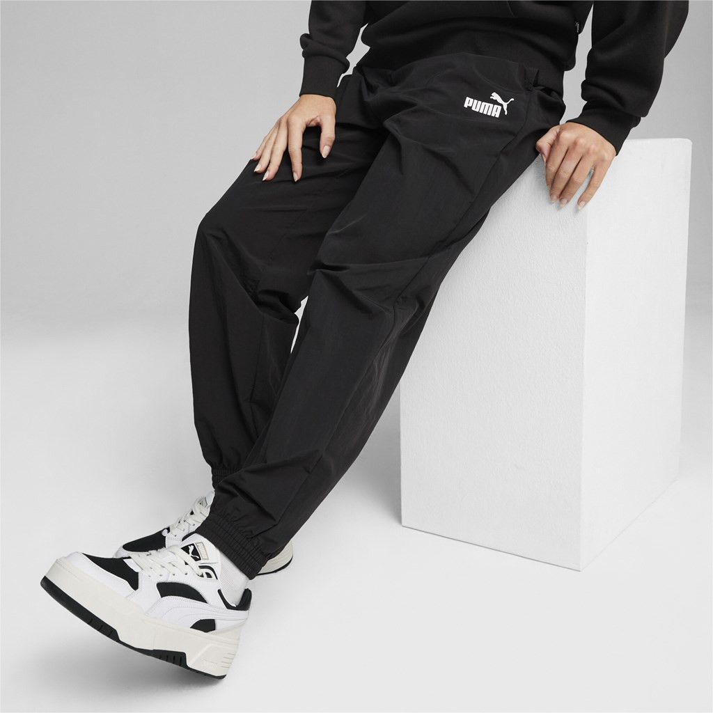 Puma ESS+ Woven Pants Dámské tepláky US L 680406-01