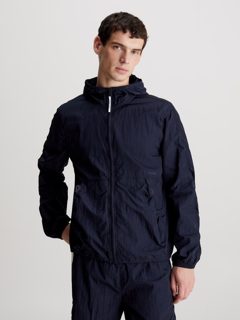 Calvin Klein WO - WIND JACKET Pánská bunda XXL 00GMS4O522BAE