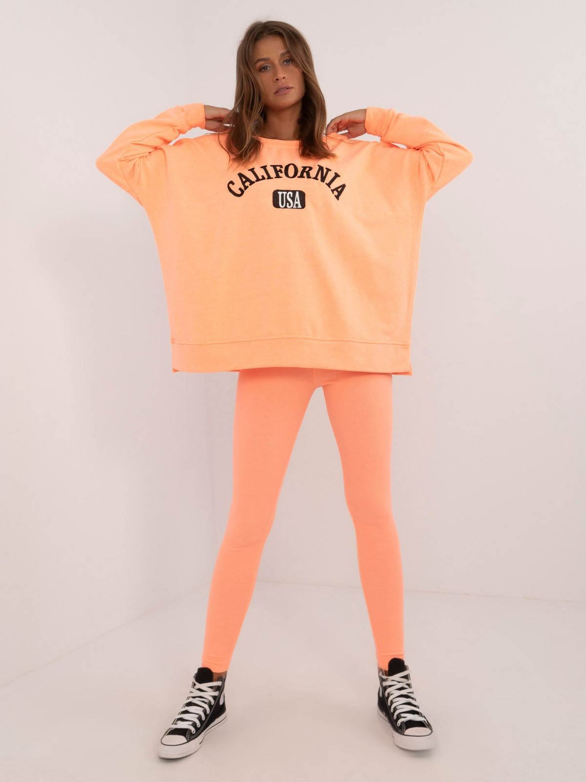 Oranžová tepláková souprava s legínami