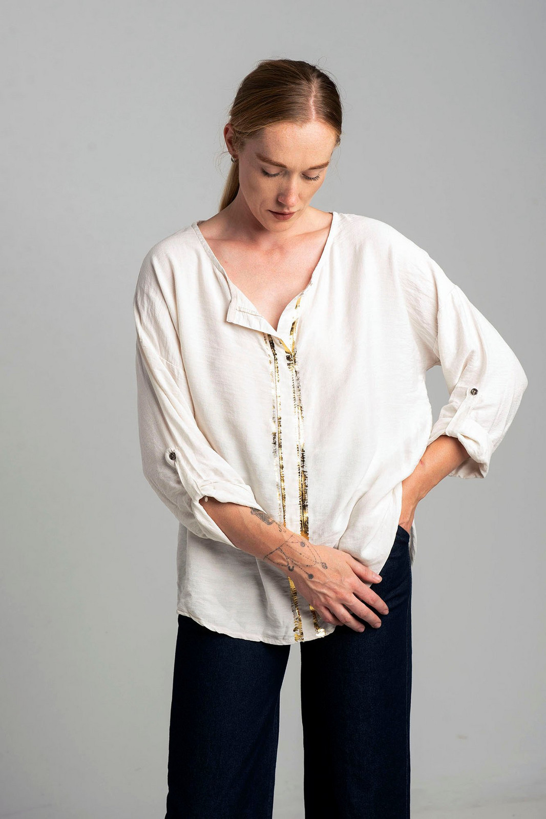 Ecru blouse with gold print