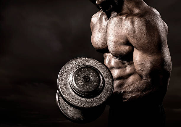 HadelProductions Fotografie Bodybuilder performing power lift curl, HadelProductions, 40 × 26.7 cm