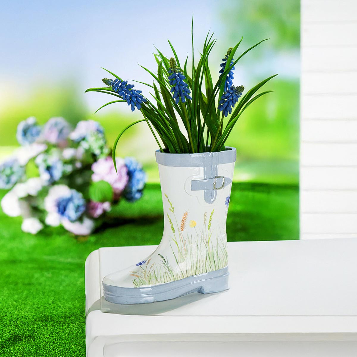 Weltbild Dekorační květináč Holínka s květy