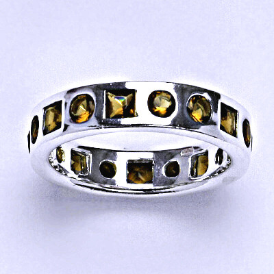 Stříbrný prsten se syntetickými barevnými zirkony, váha 5,06 g