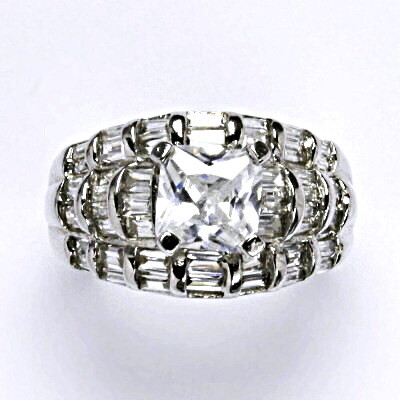 Stříbrný prsten s čirými zirkony, váha 5,95 g