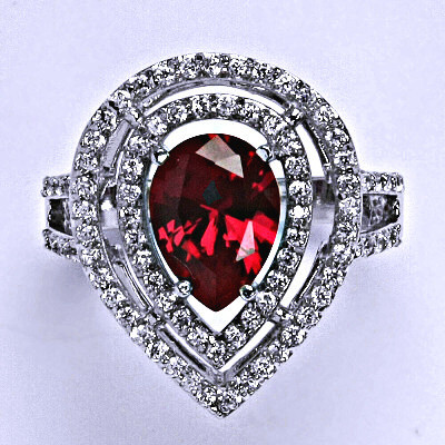 Stříbrný prsten se syntetickými barevnými zirkony, váha 8,26 g