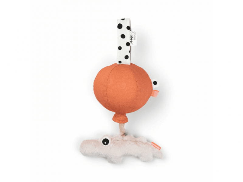 DONE BY DEER Hudební hračka Happy clouds Croco - růžový