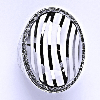 Stříbrný prsten s čirými zirkony, váha 14,07 g