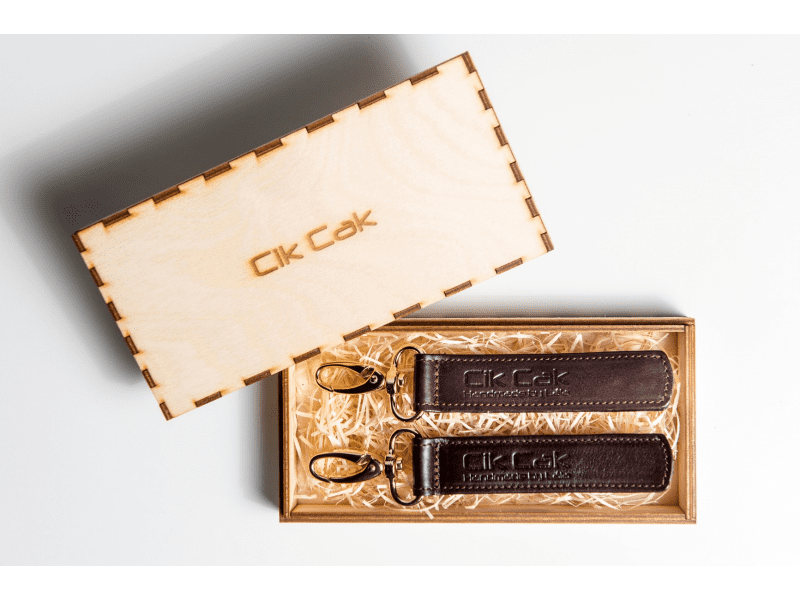 Cik Cak Úchyty na kočárek kožené tm. Hnědá zlato