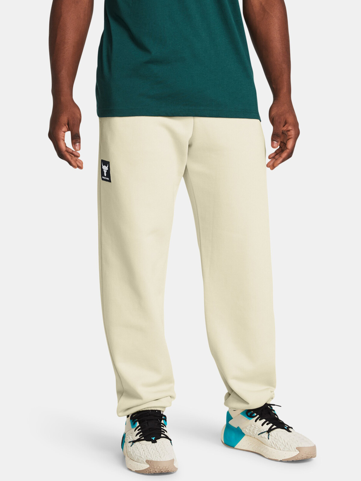 Krémové tepláky Under Armour Pjt Rock Hwt Terry Jgr