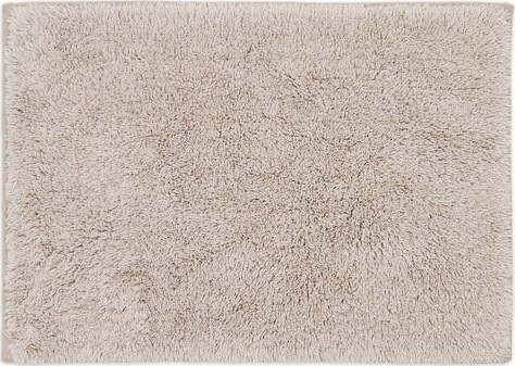 Béžová koupelnová předložka 50x70 cm Coper – Kave Home