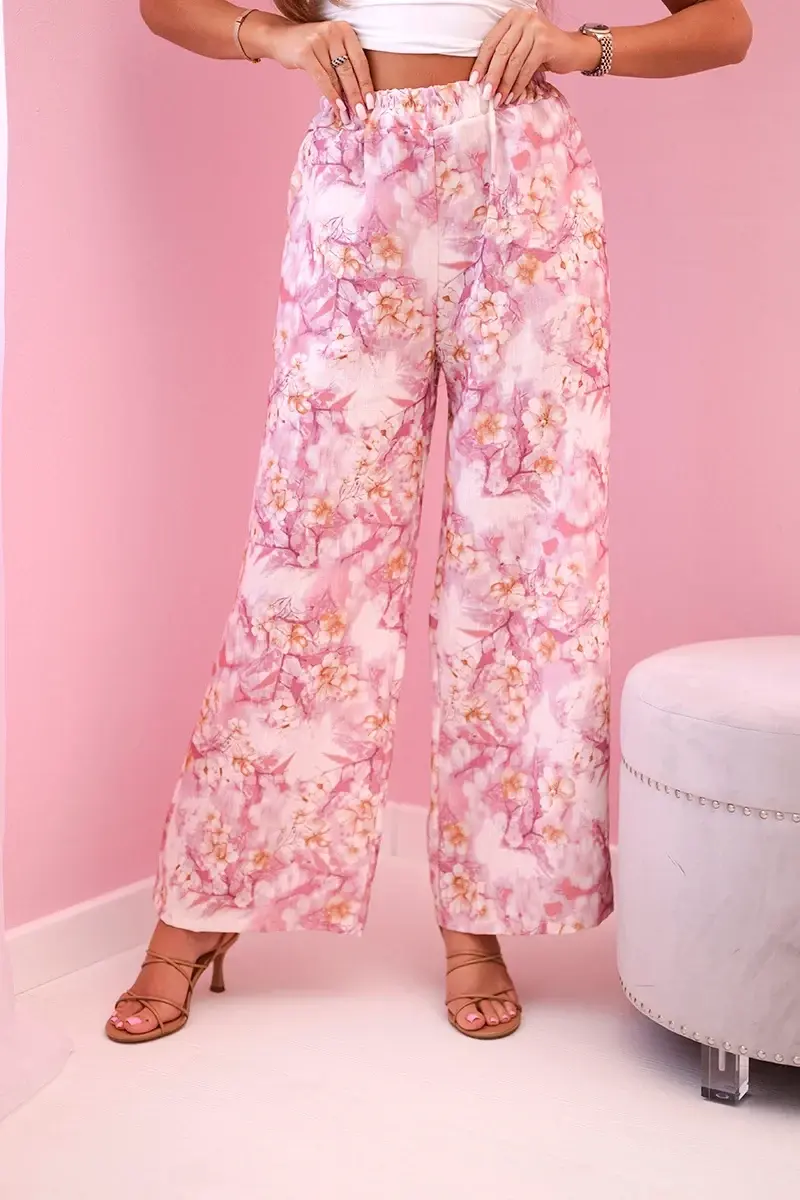 Kesi Włoski Dámské široké kalhoty s květinovým potiskem růžový