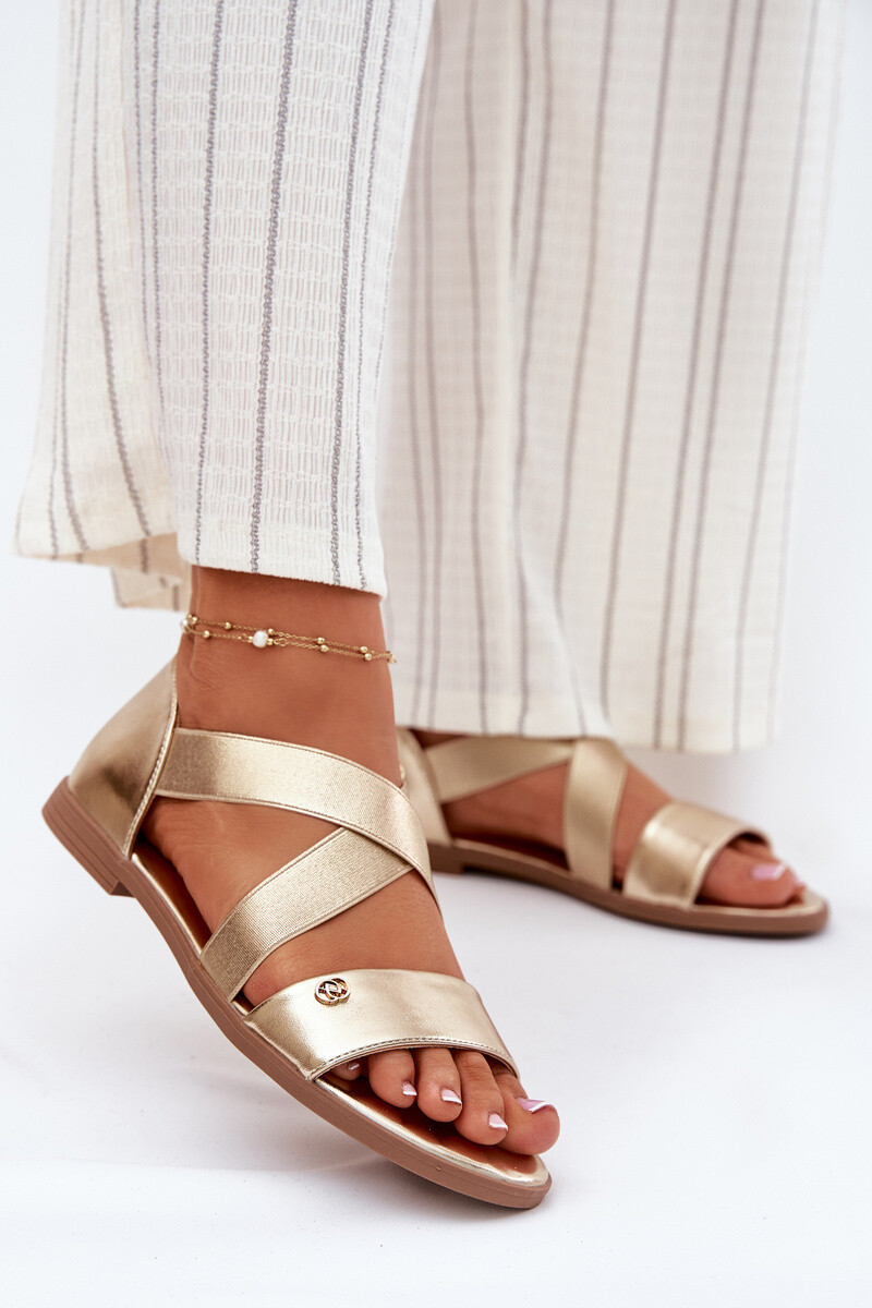 EVENTO Dámské ploché sandály s elastickými pásky zlaté Marinea