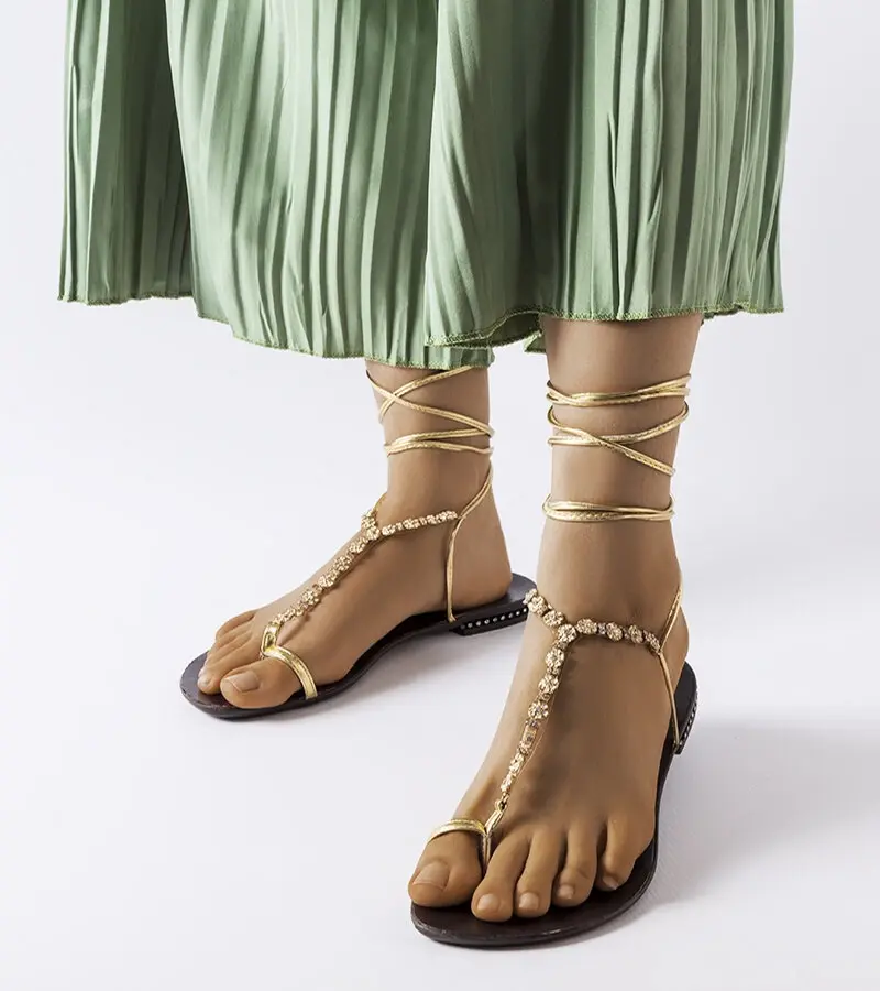 Gemre Golden sandals with zirconia Troghi